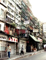 aupload.wikimedia.org_wikipedia_commons_a_a7_Kowloon_Walled_City_1991.webp