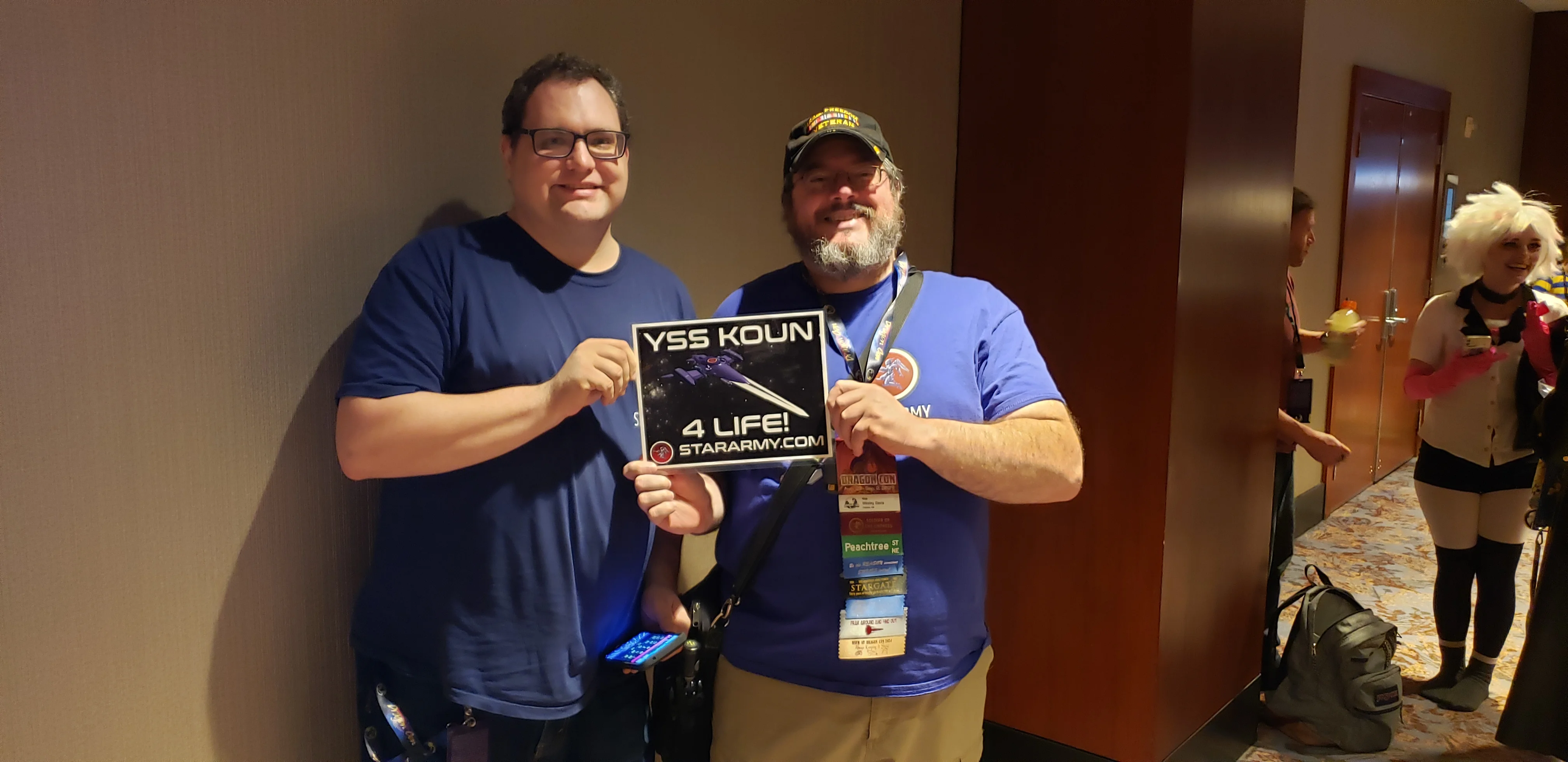 Wes and Soban with YSS Koun Sign at Dragon Con 2024